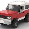 LEGO GMC Jimmy 86 scale brick model in two tone red and white color scheme on white background