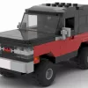 LEGO GMC Jimmy 90 scale brick model in two tone red and black color scheme on white background