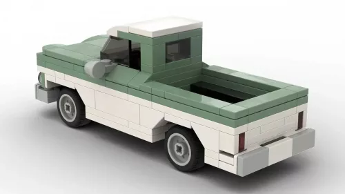 LEGO Chevrolet Apache 10 60 scale brick model with two tone white and sand green pain scheme on white background rear view angle