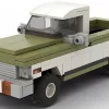 LEGO Chevrolet C20 Pickup 72 scale brick model in two tone dark green and white paint scheme on white background