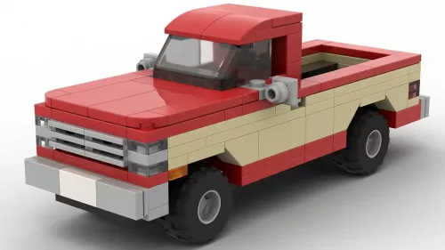 LEGO Chevrolet K10 Silverado 84 scale brick model in two tone red and tan color scheme on white background