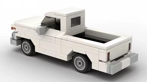 LEGO GMC 1000 Pickup 63 scale brick model on white background rear view angle