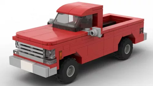 LEGO GMC C10 High Sierra 77 scale brick model in red color on white background