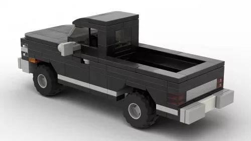 LEGO GMC C1500 Sierra Classic 85 scale brick model in black color on white background rear view angle