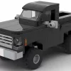 LEGO GMC K15 High Sierra Fenderside 77 scale brick model in black color on white background