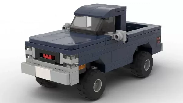 LEGO GMC K1500 Sierra 4x4 86 scale brick model in dark blue color on white background