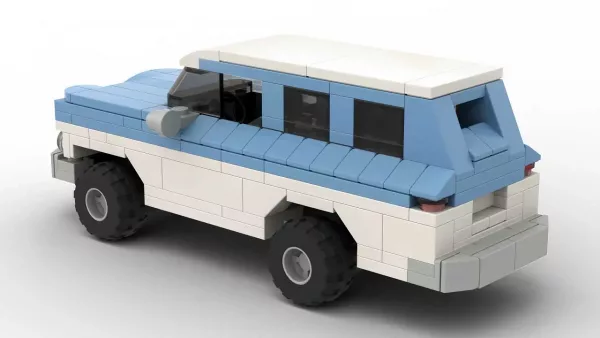 LEGO Chevrolet Suburban 61 scale brick model in two tone white and blue color scheme on white background rear view angle