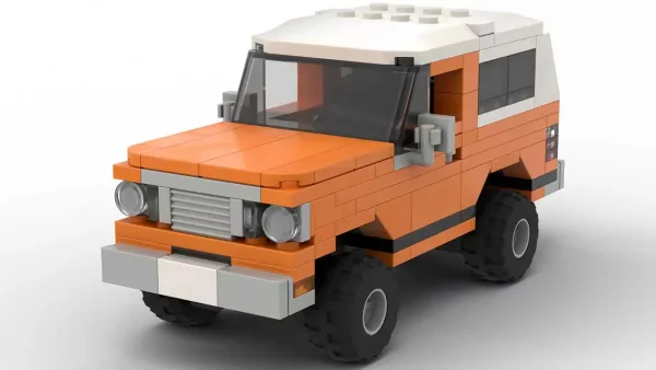 LEGO Dodge Ramcharger 77 scale brick model in orange color on white background