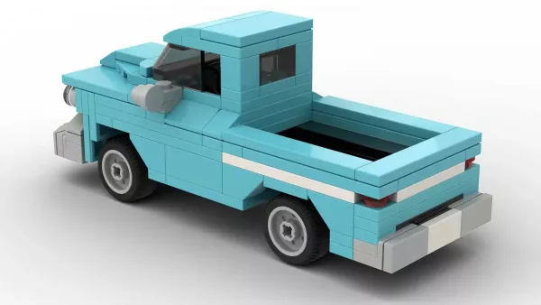 LEGO City GMC Pickup 1959 scale brick model in light blue color on white background rear view angle