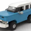 LEGO GMC Suburban 61 scale brick model in blue color with white roof on white background