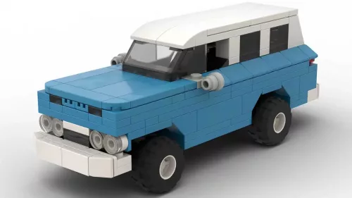 LEGO GMC Suburban 61 scale brick model in blue color with white roof on white background