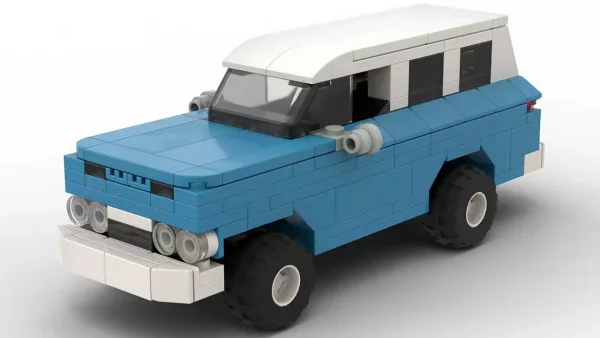 LEGO GMC Suburban 61 scale brick model in blue color with white roof on white background