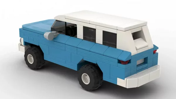 LEGO GMC Suburban 61 scale brick model in blue color with white roof on white background rear view angle