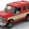 LEGO Chevrolet Suburban 79 scale brick model in two tone red and tan color scheme on white background