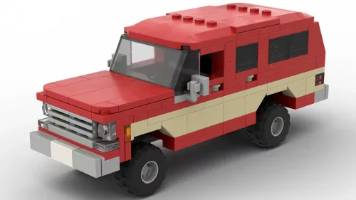 LEGO Chevrolet Suburban 79 scale brick model in two tone red and tan color scheme on white background