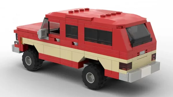 LEGO Chevrolet Suburban 79 scale brick model in two tone red and tan color scheme on white background rear view angle