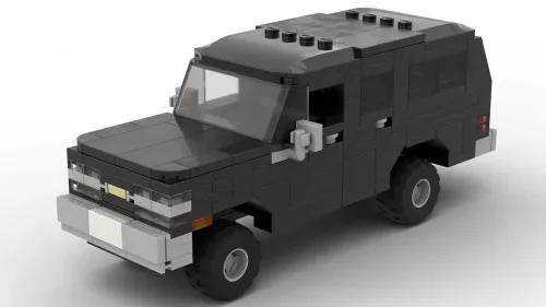 LEGO Chevrolet Suburban 91 scale brick model in black color on white background