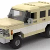 LEGO GMC Suburban 78 scale brick model in two tone white and tan color scheme on white background