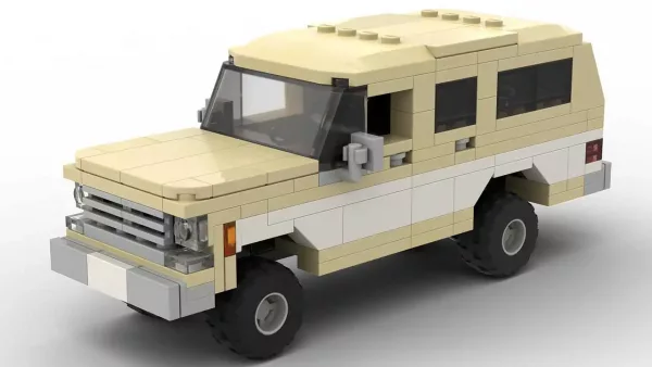 LEGO GMC Suburban 78 scale brick model in two tone white and tan color scheme on white background