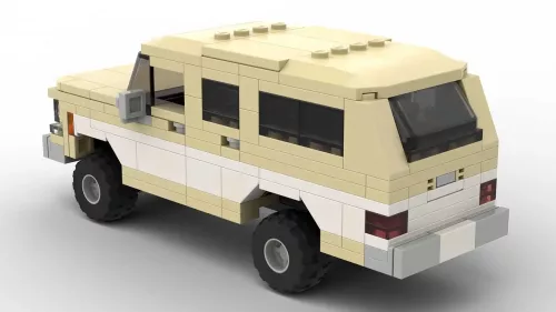 LEGO GMC Suburban 78 scale brick model in two tone white and tan color scheme on white background rear view angle