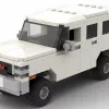 LEGO GMC Suburban 85 scale brick model in white background on white background