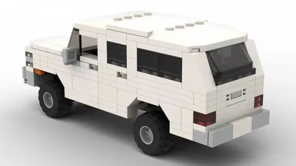 LEGO GMC Suburban 85 scale brick model in white color on white background rear view angle