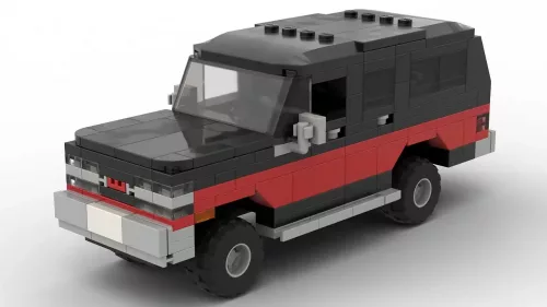 LEGO GMC Suburban 90 scale brick model in two tone red and black color scheme on white background