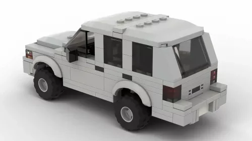 LEGO Dodge Durango 99 scale brick model in gray color on white background rear view angle