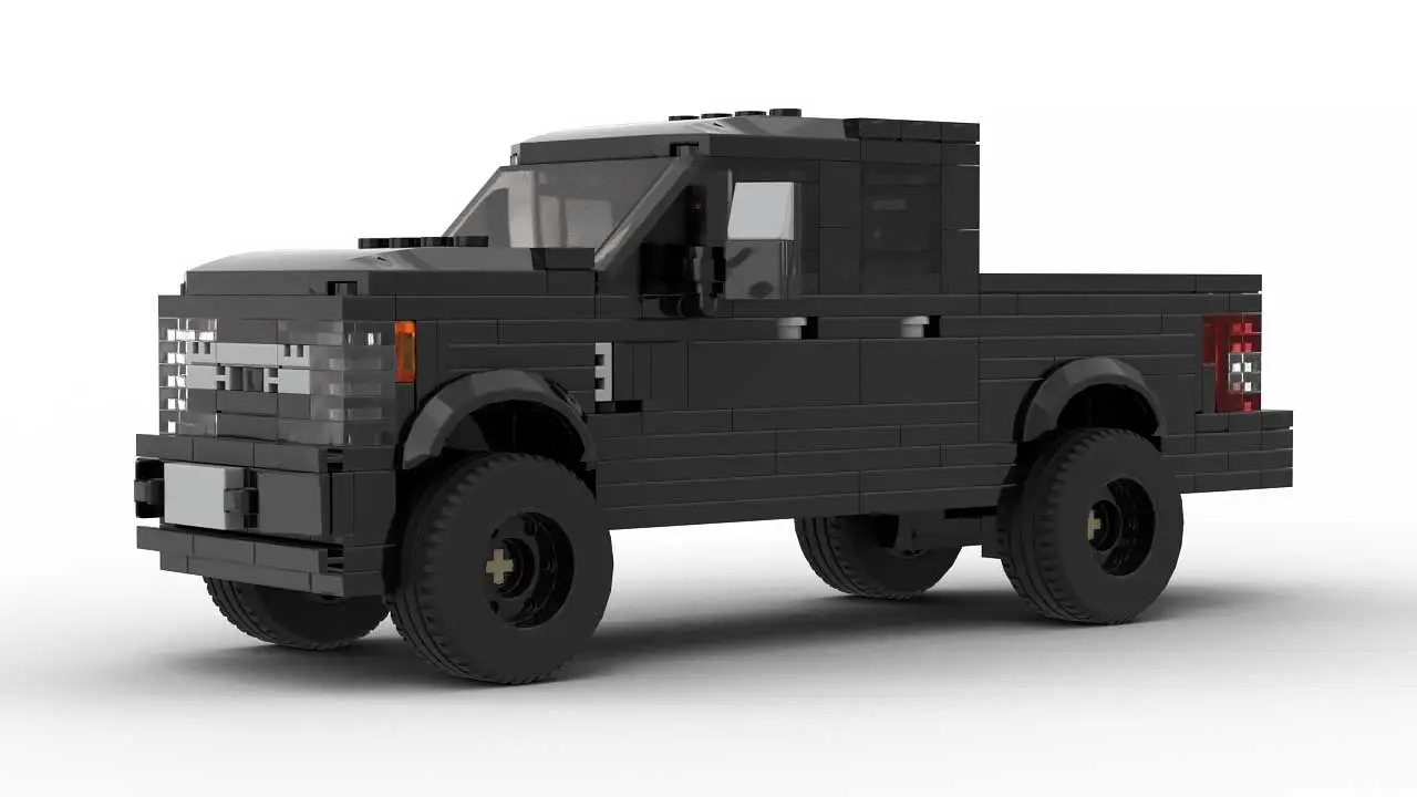 Black LEGO ford pickup truck model on white background