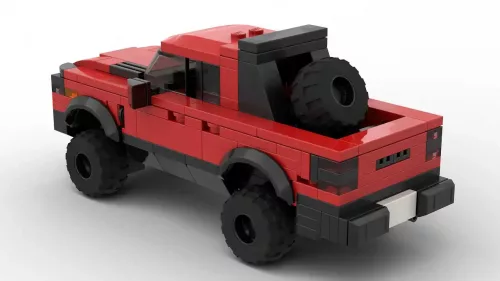 LEGO Ram 1500 TRX 21 Rambar scale brick model in red color on white background rear view angle