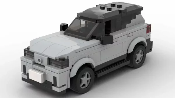 LEGO Volvo EX40 25 scale brick model in gray color on white background