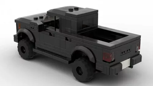 LEGO Ford F150 Raptor 21 scale brick model in black color on white background rear view angle