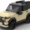 LEGO Lexus GX 550 24 scale brick model in tan color on white background