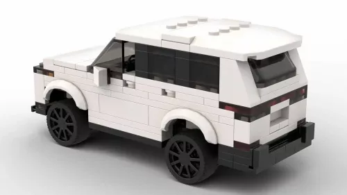 LEGO Lexus LX 600 24 scale brick model in whiter color on white background rear view angle