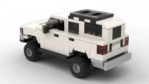 LEGO Toyota 4Runner 95 scale brick model in white color on white background rear view angle