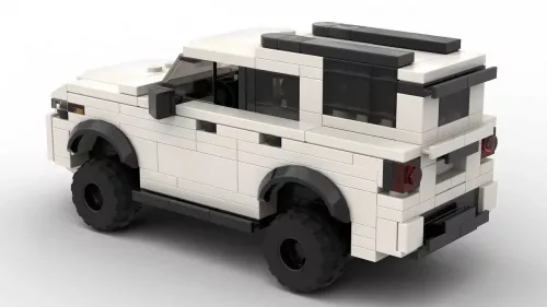 LEGO Toyota 4Runner TRD Pro 25 scale brick model in white color on white background rear view angle