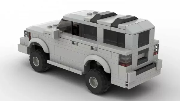 LEGO Toyota 4Runner Limited 01 scale brick model in gray color on white background in rear view angle